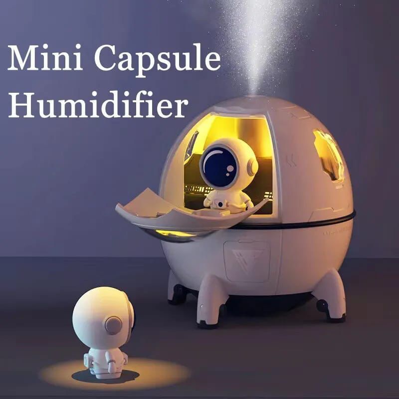 Humidificador astronauta en cápsula